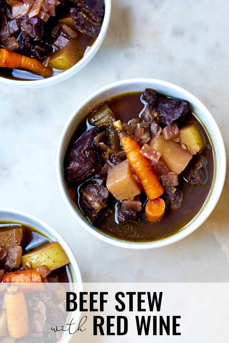 Three bowls of beef stew.