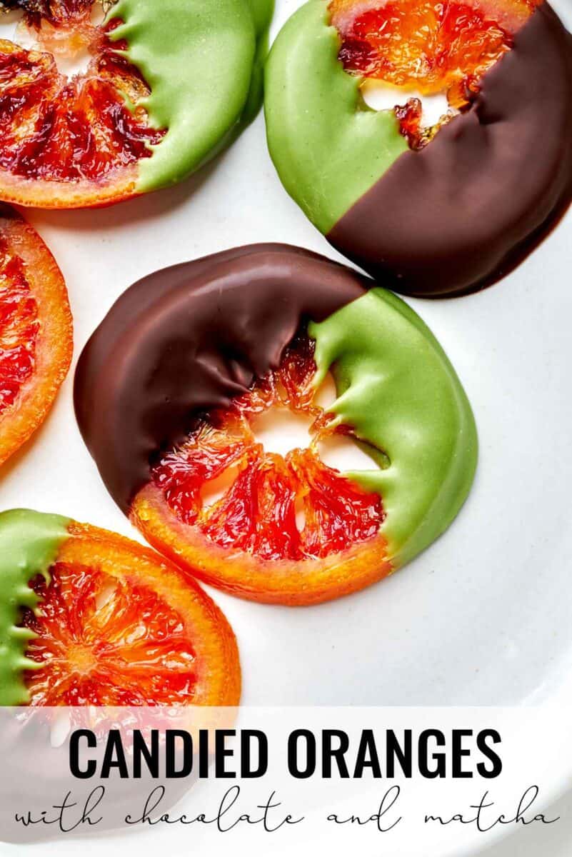 Oranges dipped in chocolate and green chocolate.