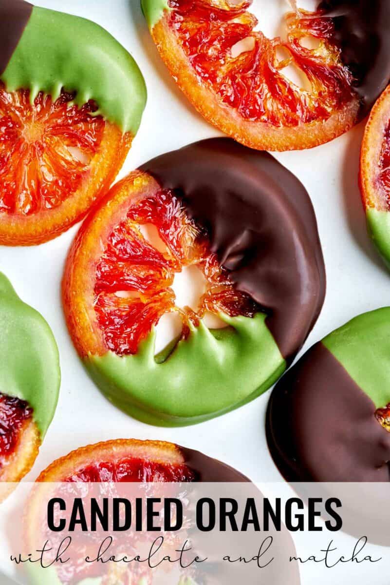 Oranges dipped in chocolate and green chocolate.