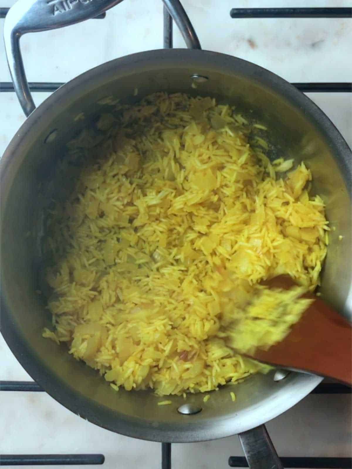 Yellow rice in a pot.