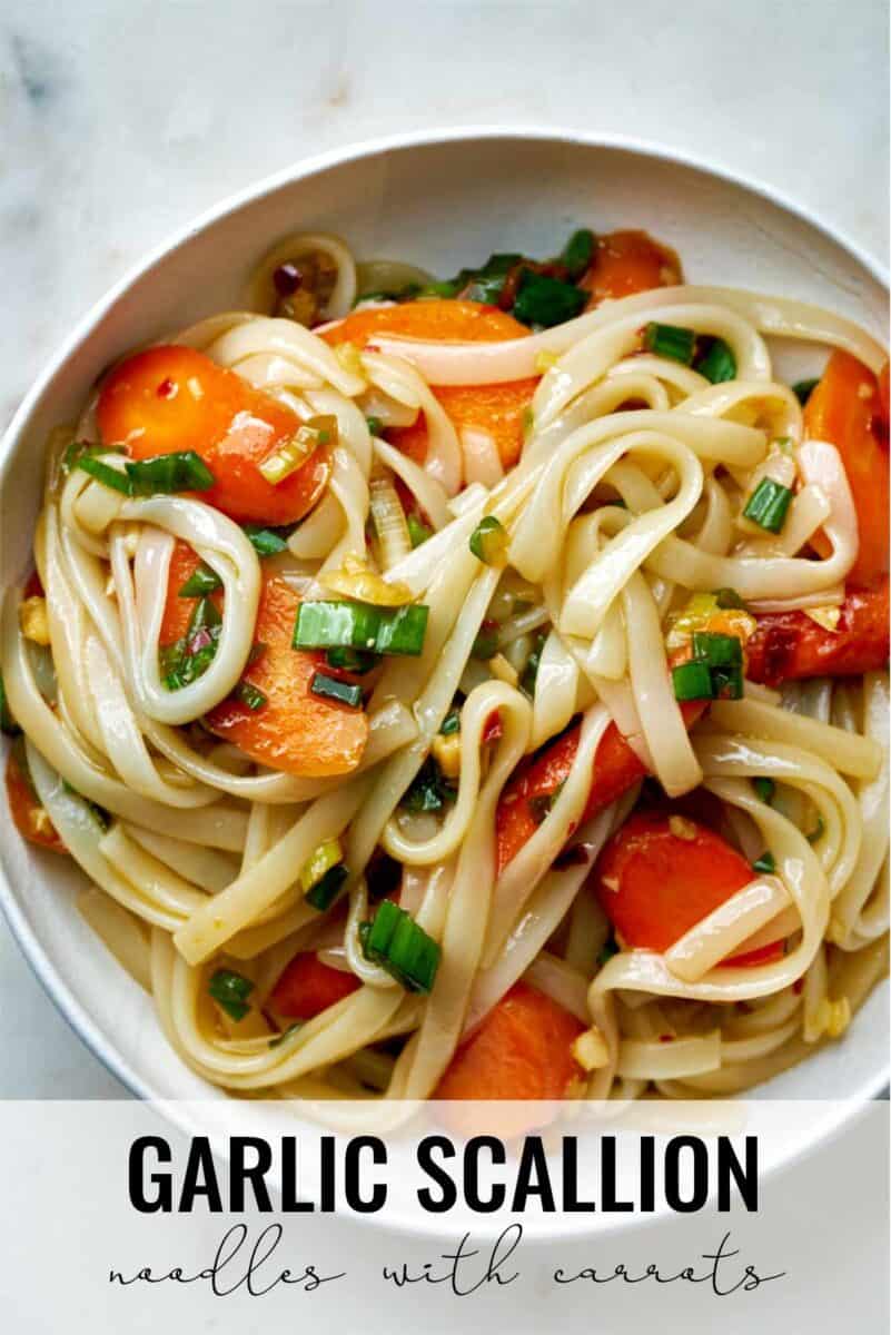 Noodles with carrots in a bowl.