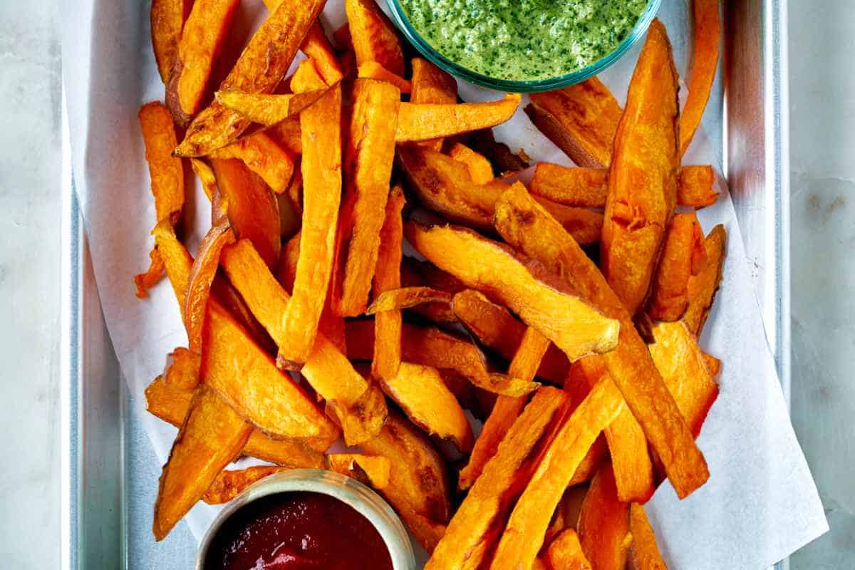 Sweet potato fries on a tray.