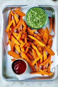 Sweet potato fries on a tray.