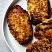 Meat patties on a plate.