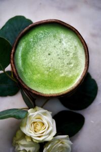 Bowl of matcha with roses.