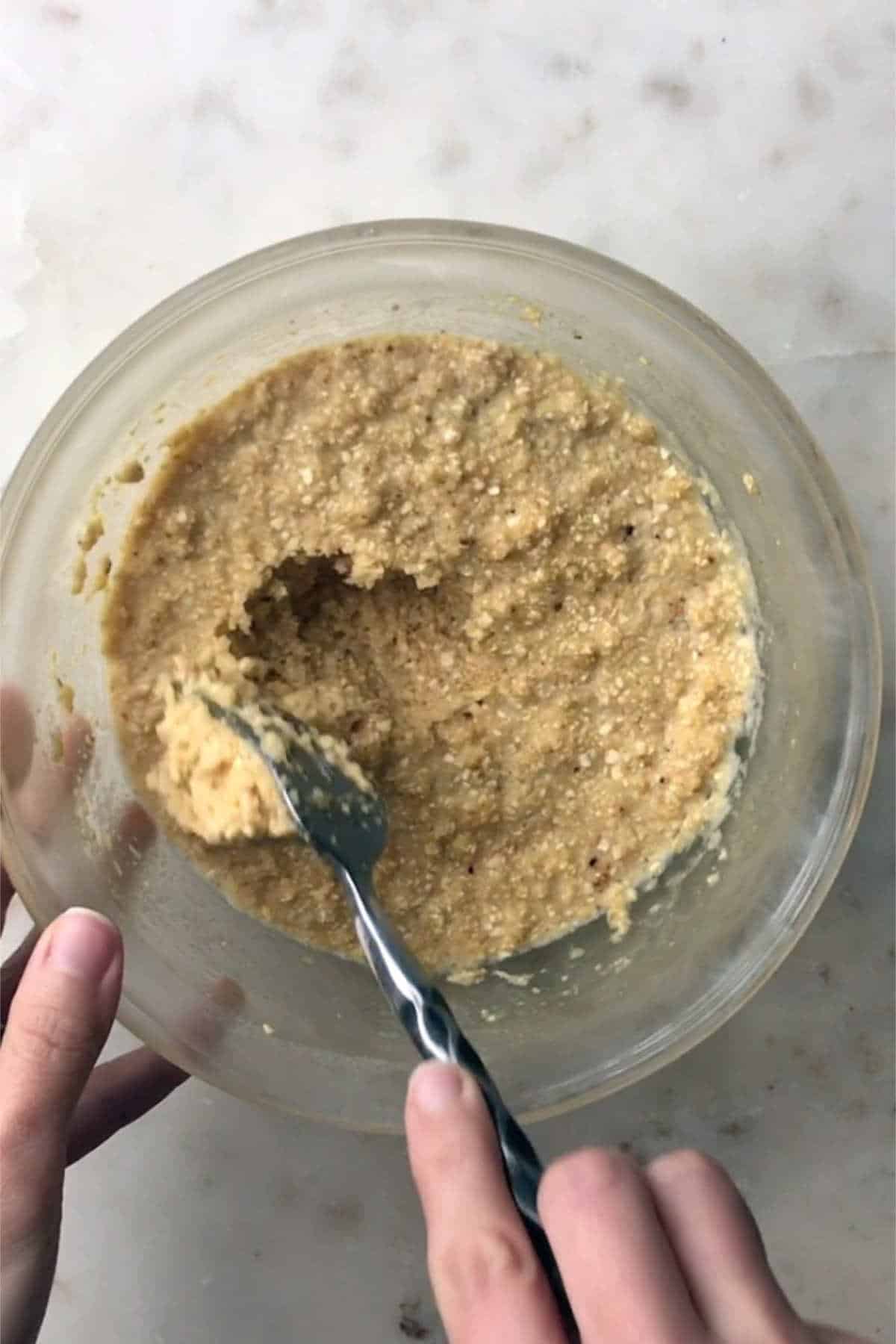 Beige mixture with a fork.