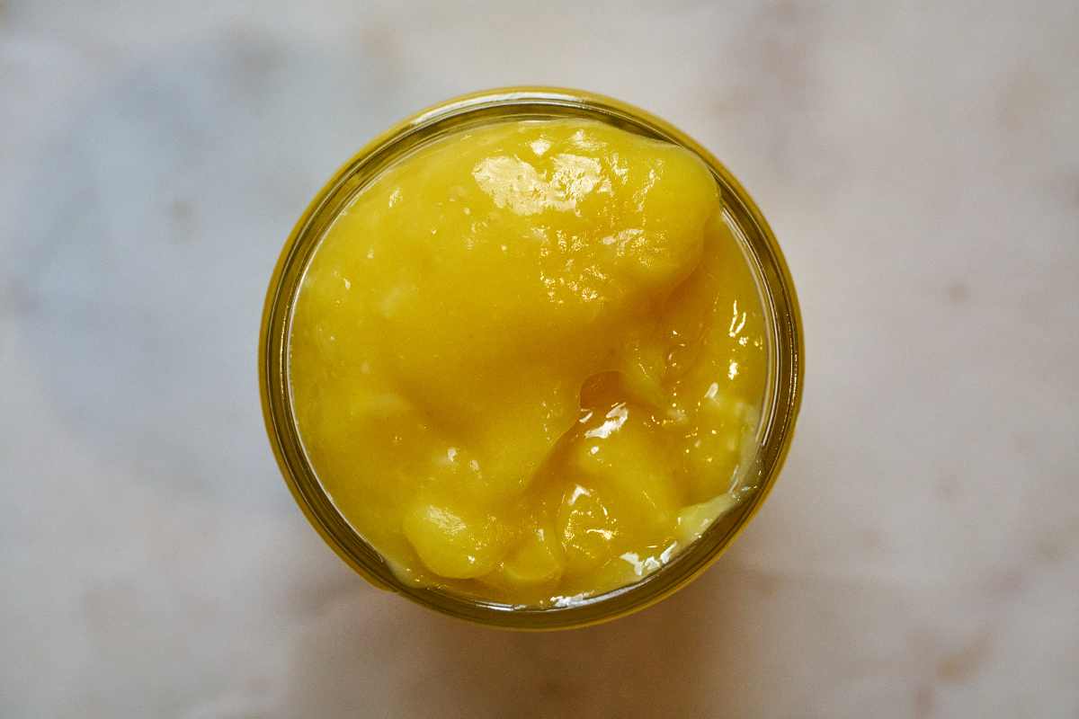 Yellow curd in a jar.