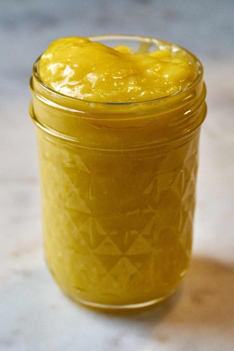 Yellow curd in a jar.