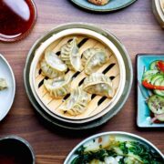 Dumpling dinner with sides.