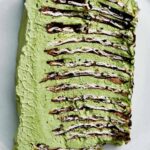 Slice of green ice box cake.