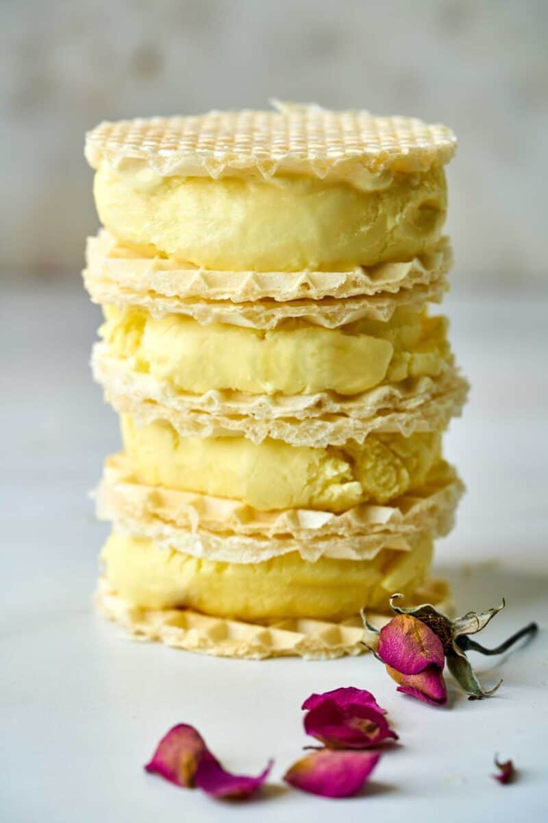 Stack of yellow ice cream sandwiches.