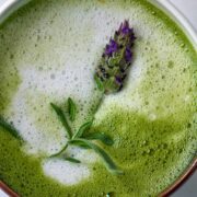 Green latte with lavender sprig.