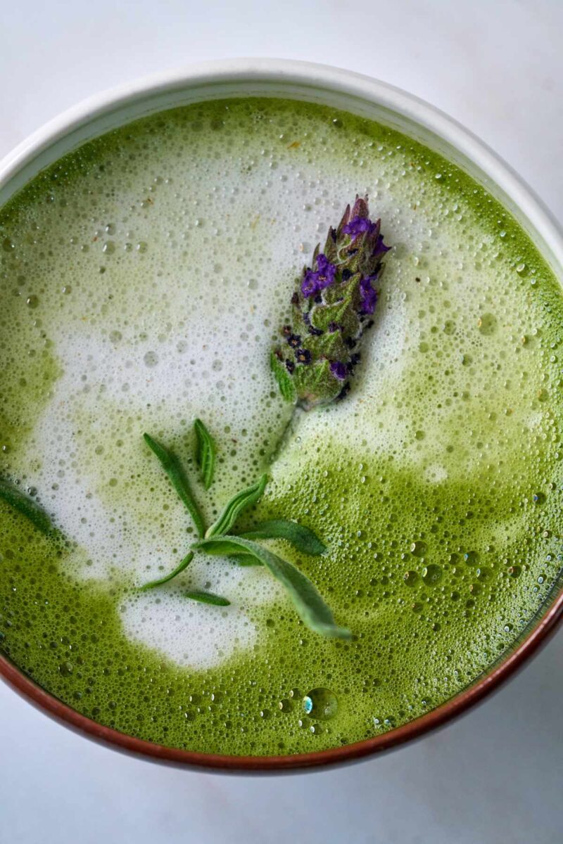 Green latte with lavender sprig.