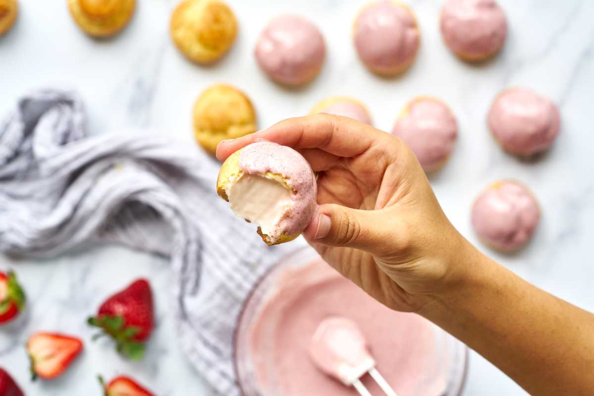 Inside a pink cream puff.