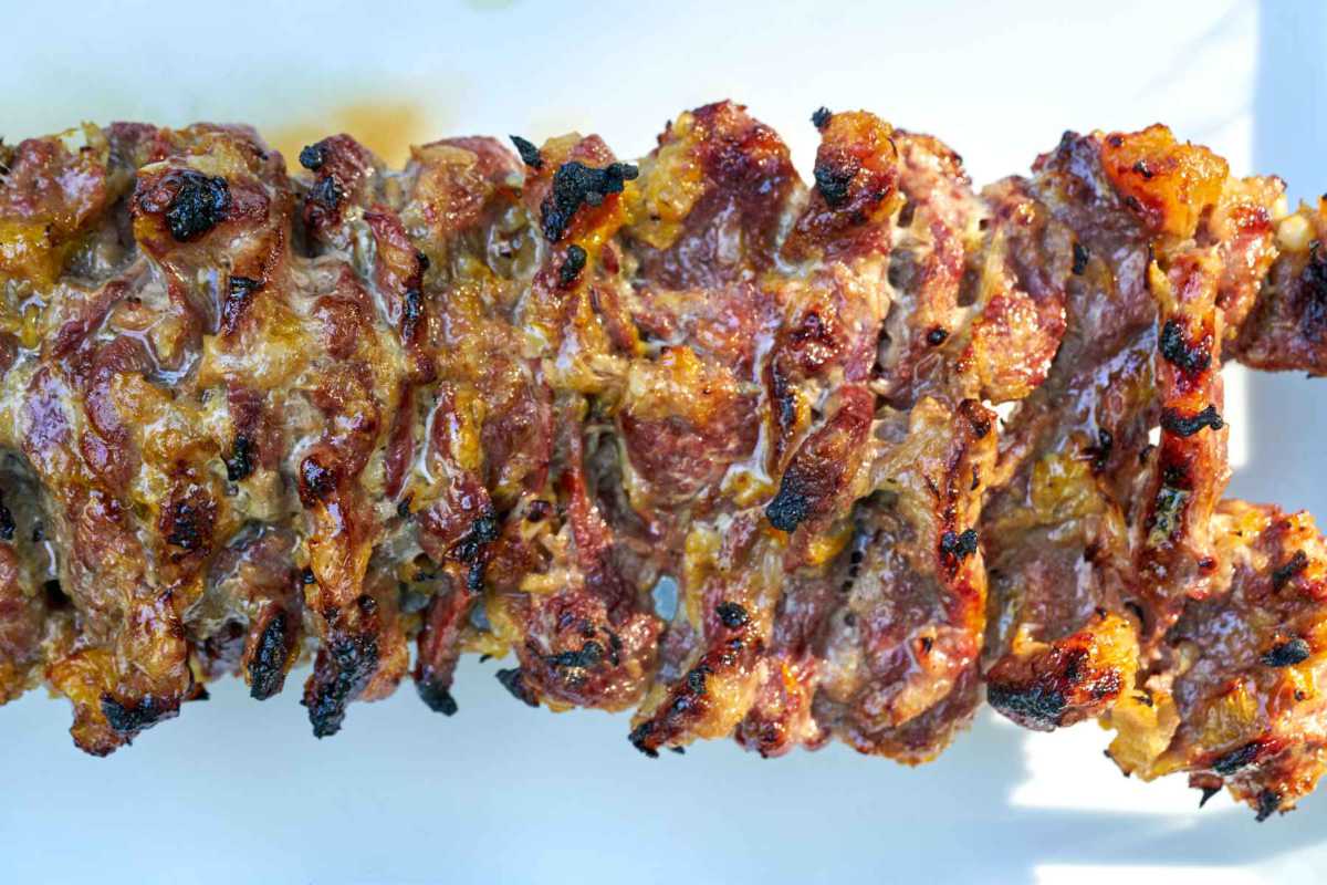 Barbecued meat on a plate.