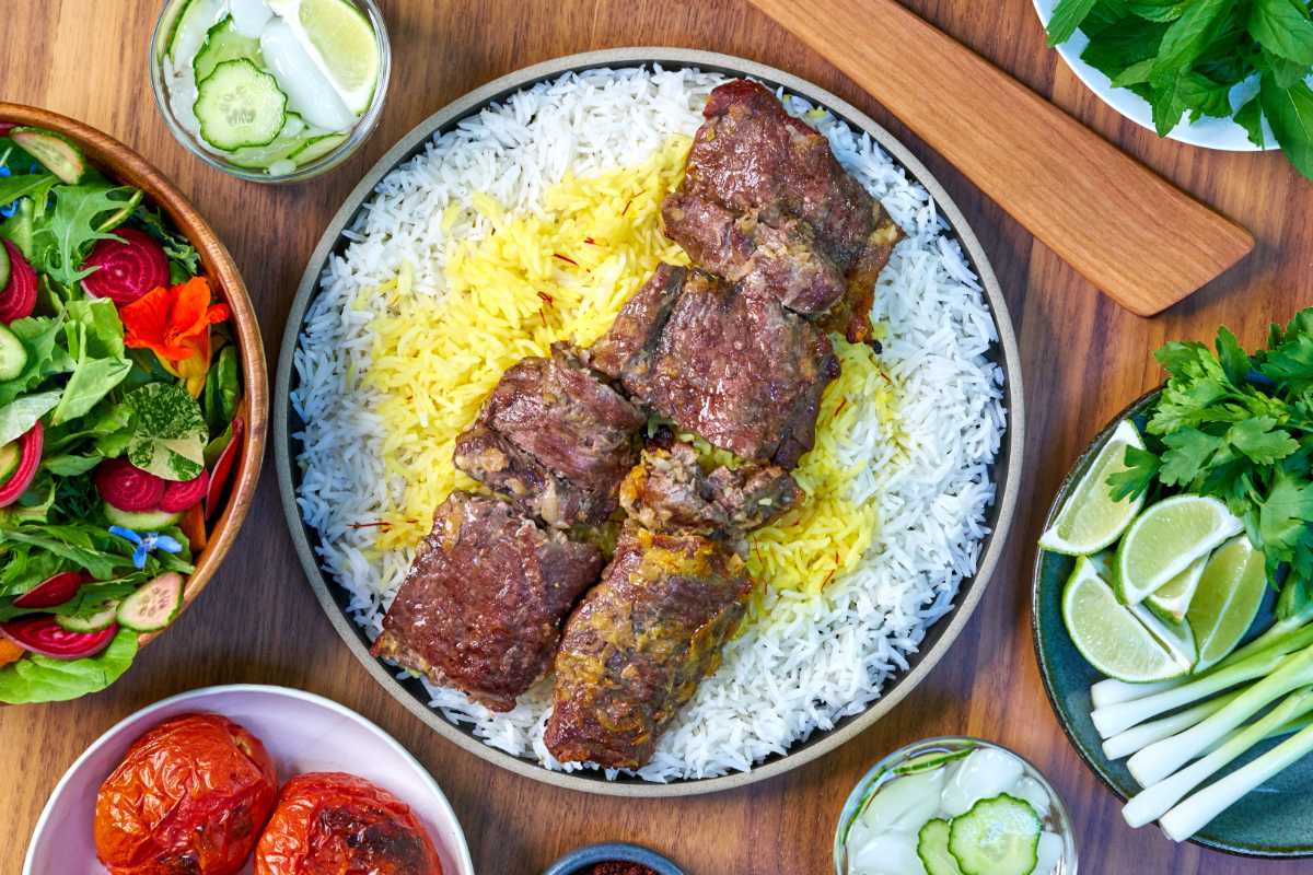 Kabob with rice and salad.