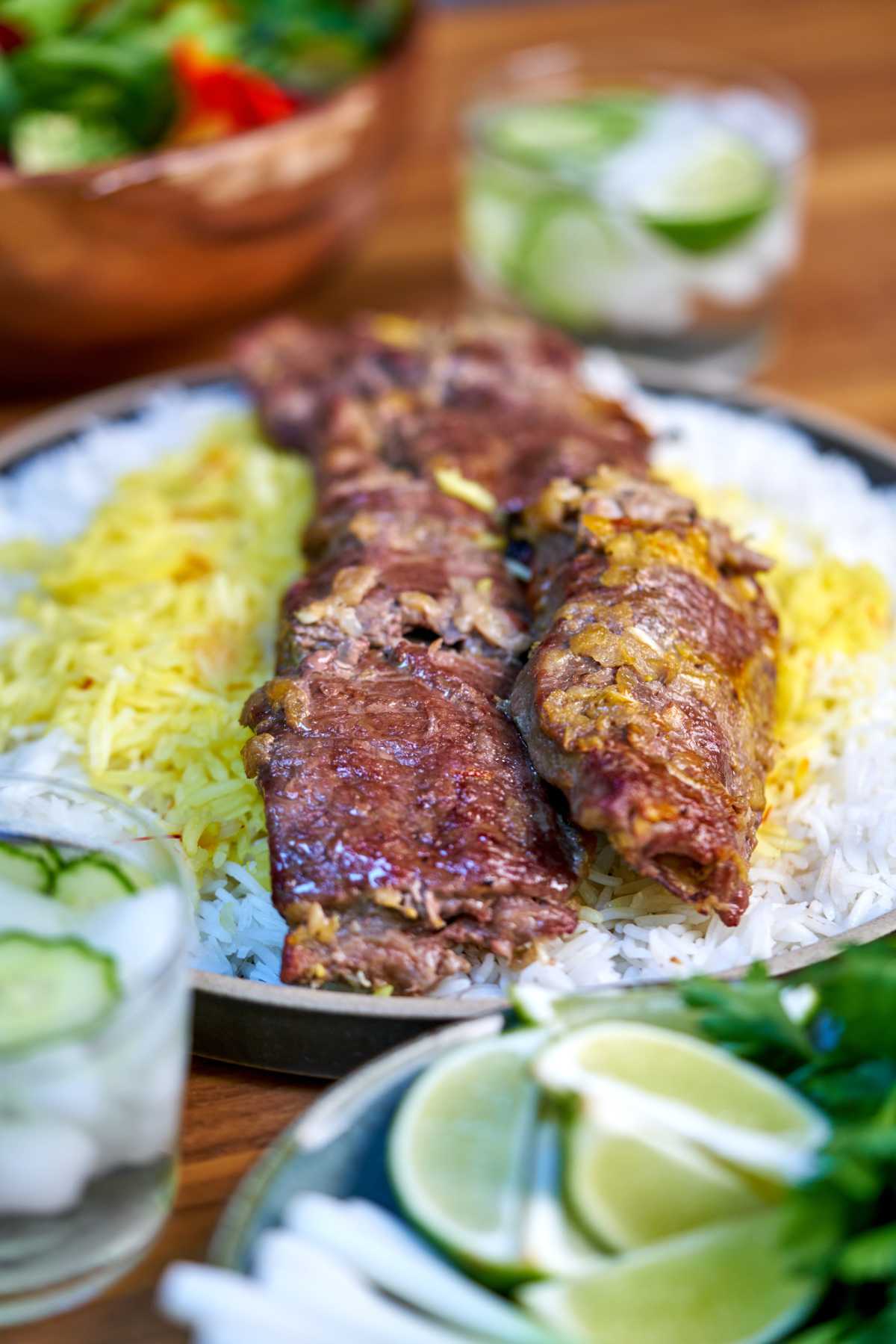 Kabob with rice and salad.