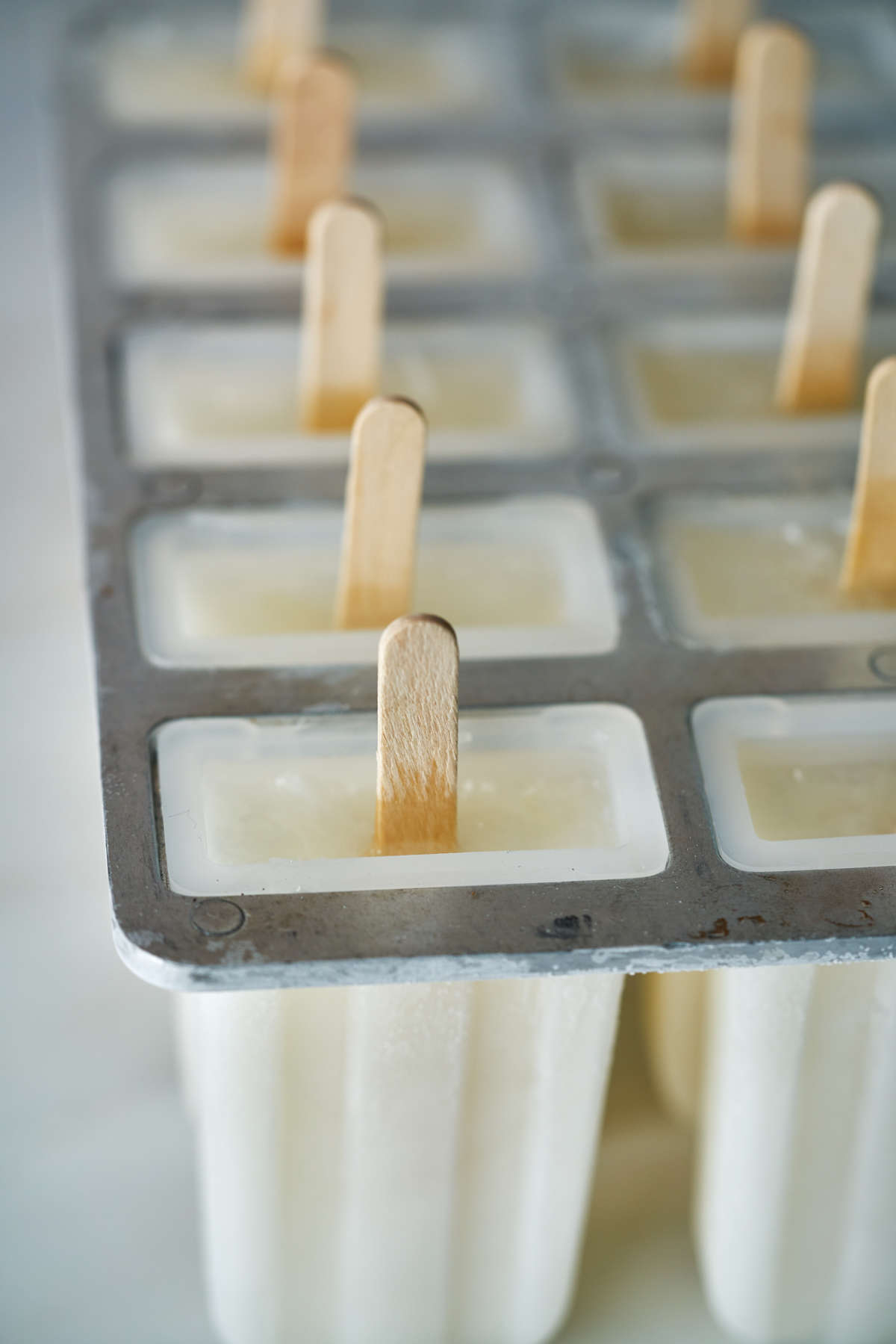 White popsicles in mold.