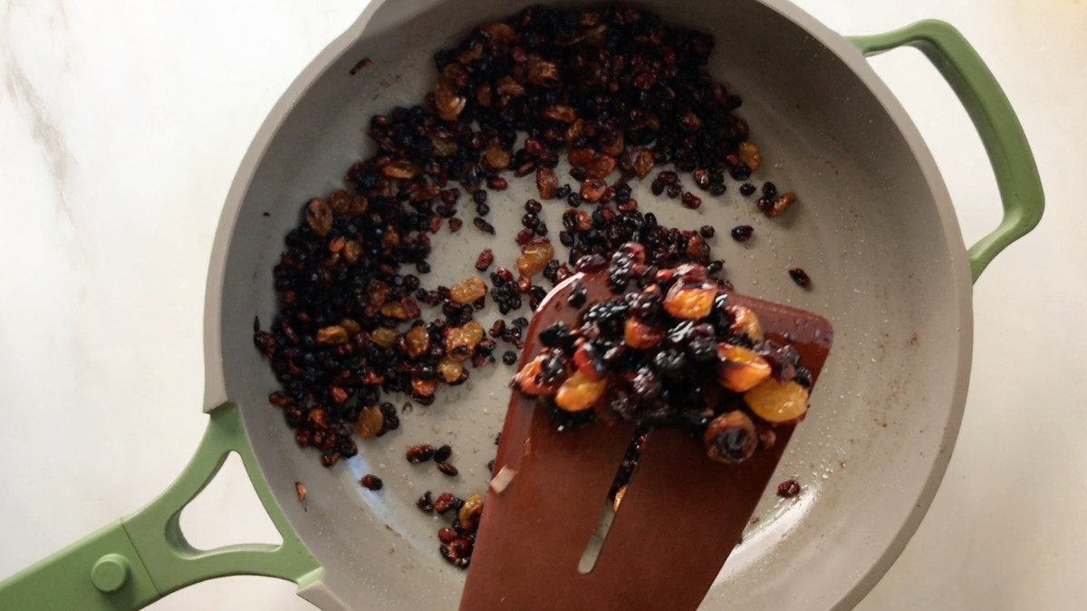 Dried fruit in a fry pan.