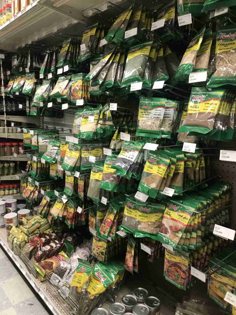 Bags of spices in a grocery store.