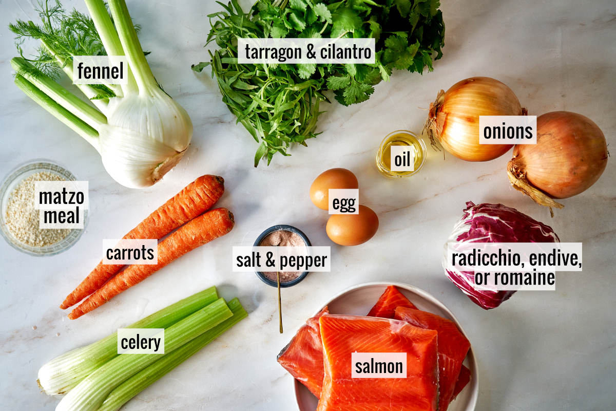 Salmon and produce on a white countertop.