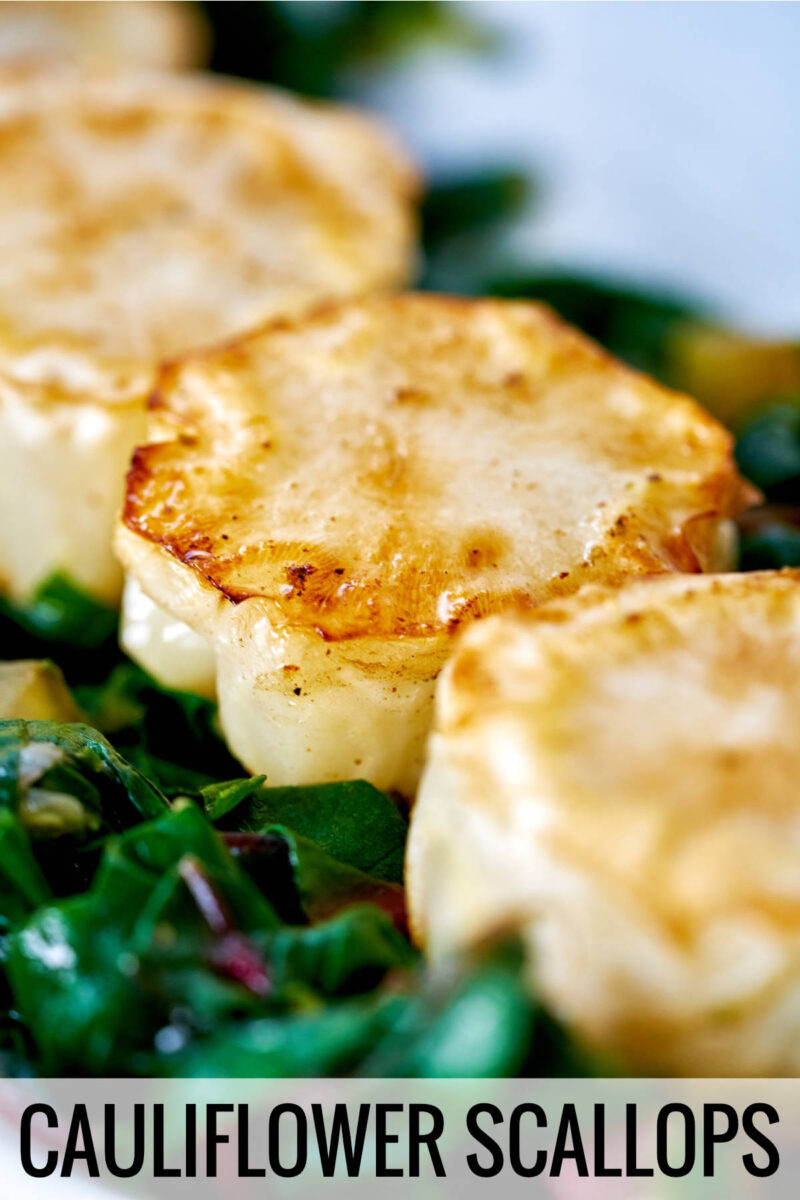 Cauliflower discs on a bed of cooked greens with title text.