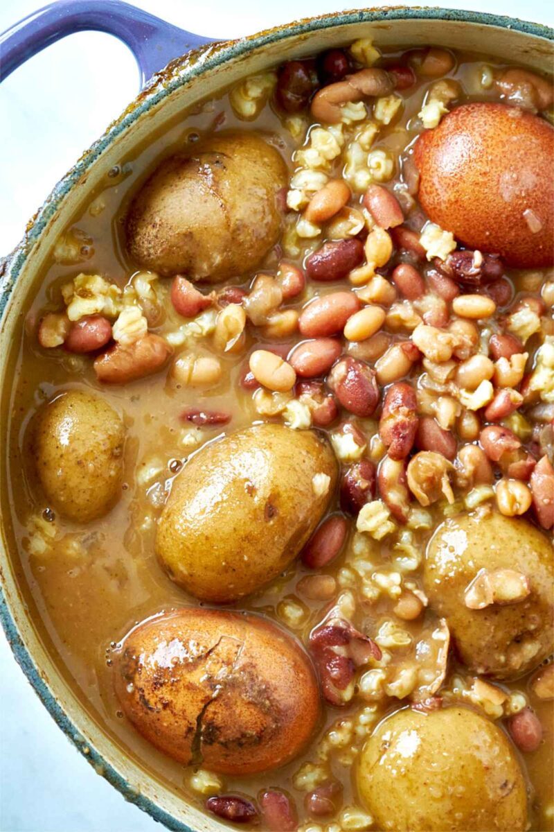 Bean soup in a pot with potatoes.