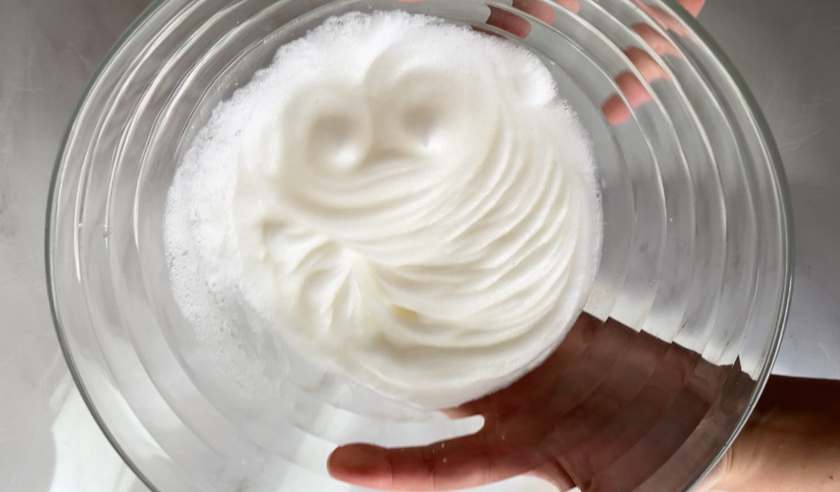 Egg whites whipped into a meringue.