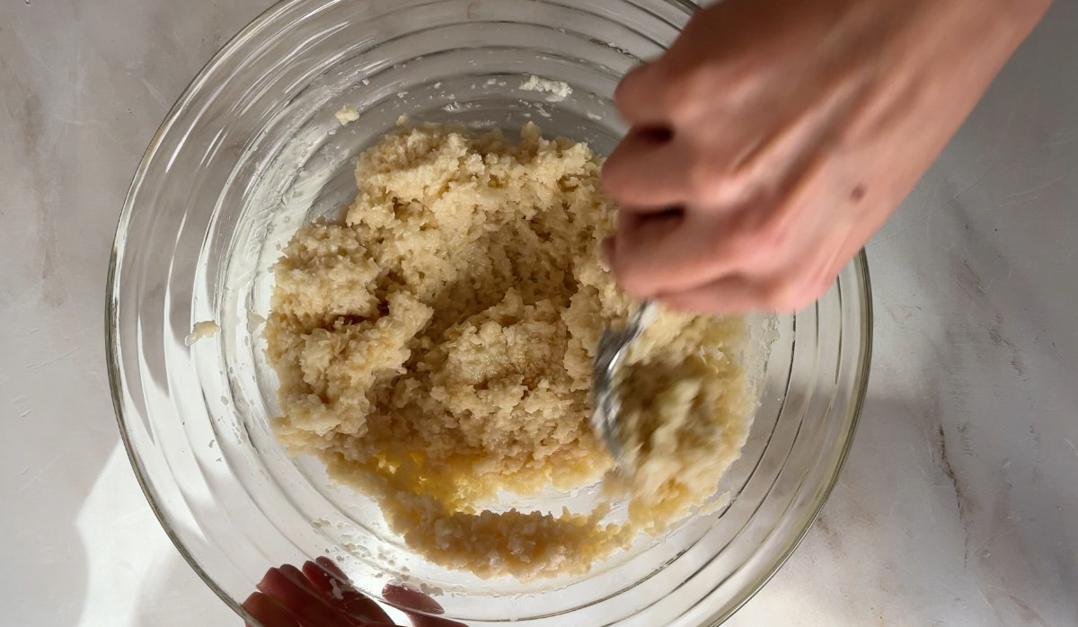 Coconut macaroon batter mixed in a bowl.