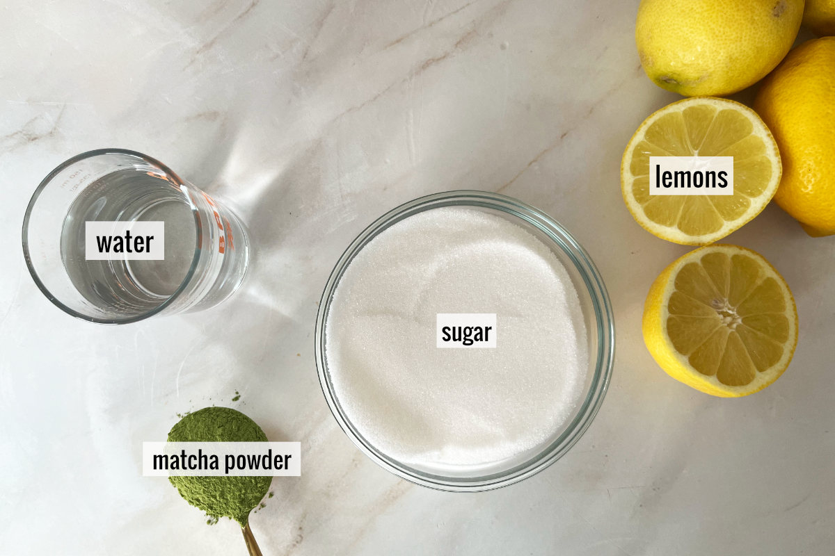 Lemons and other ingredients on a countertop.