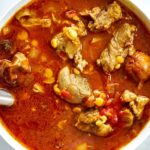 Serving bowl with red meat stew.