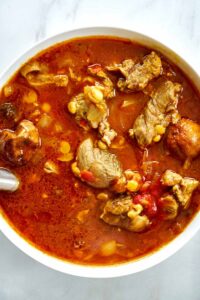 Serving bowl with red meat stew.