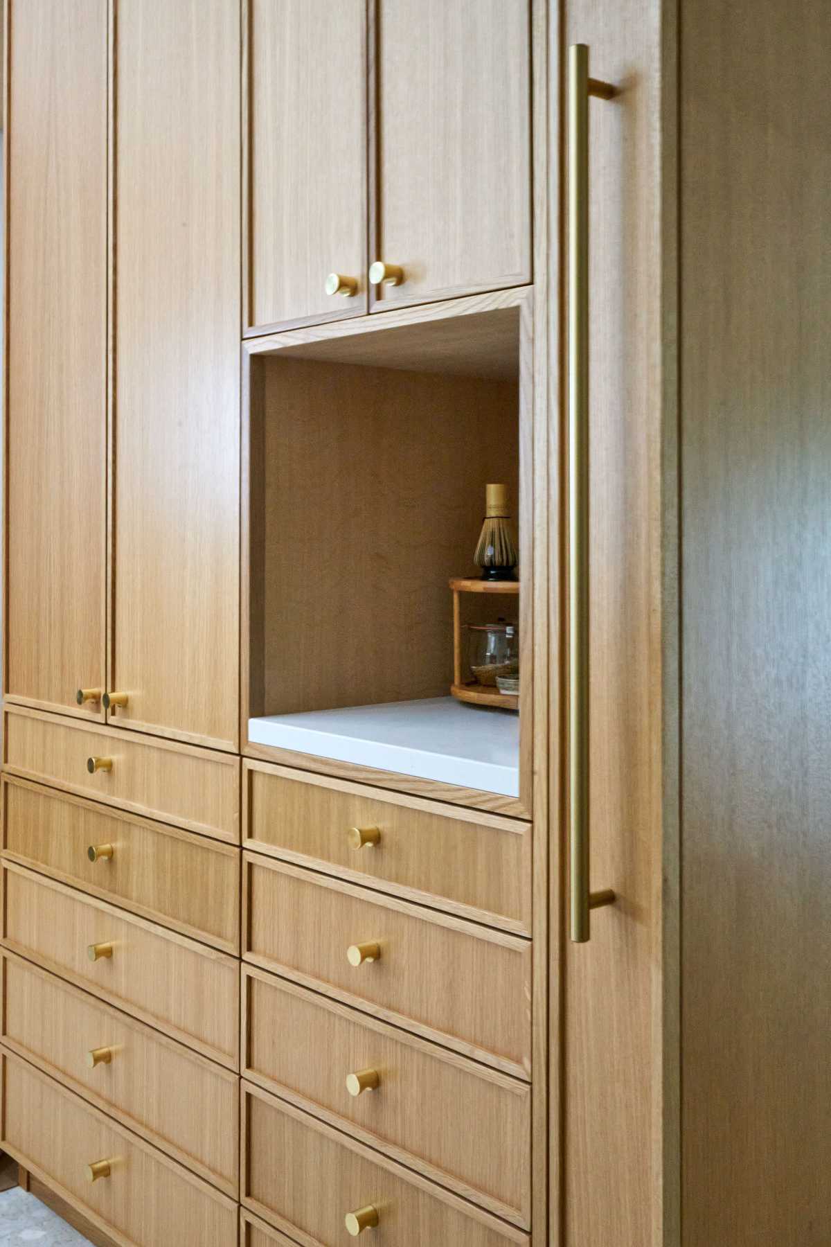 Wood cabinets with small countertop area.