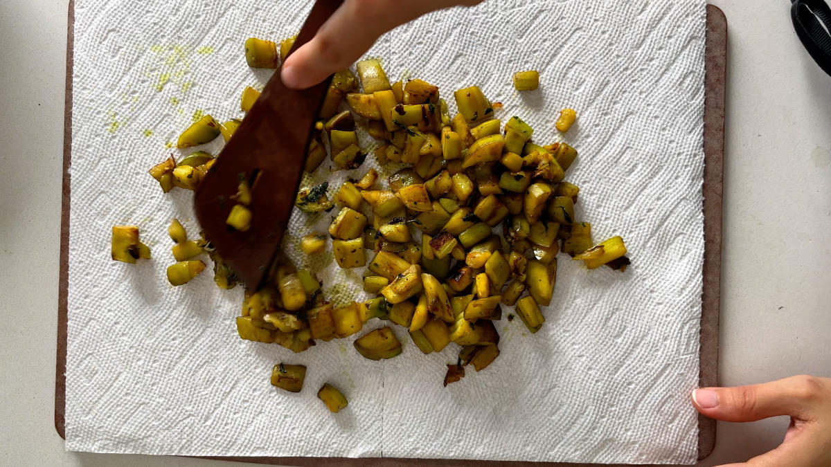 Cubed eggplant on a paper towel.