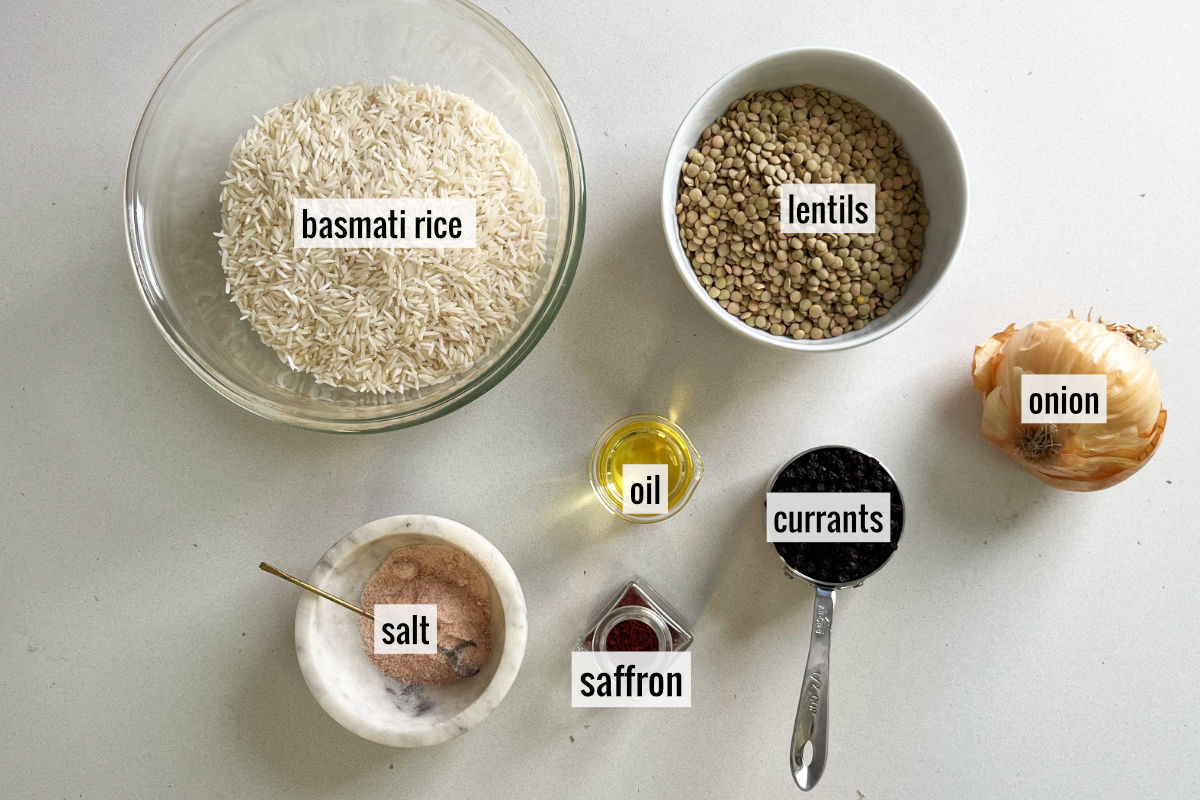 Lentils, rice, and other ingredients on a countertop.
