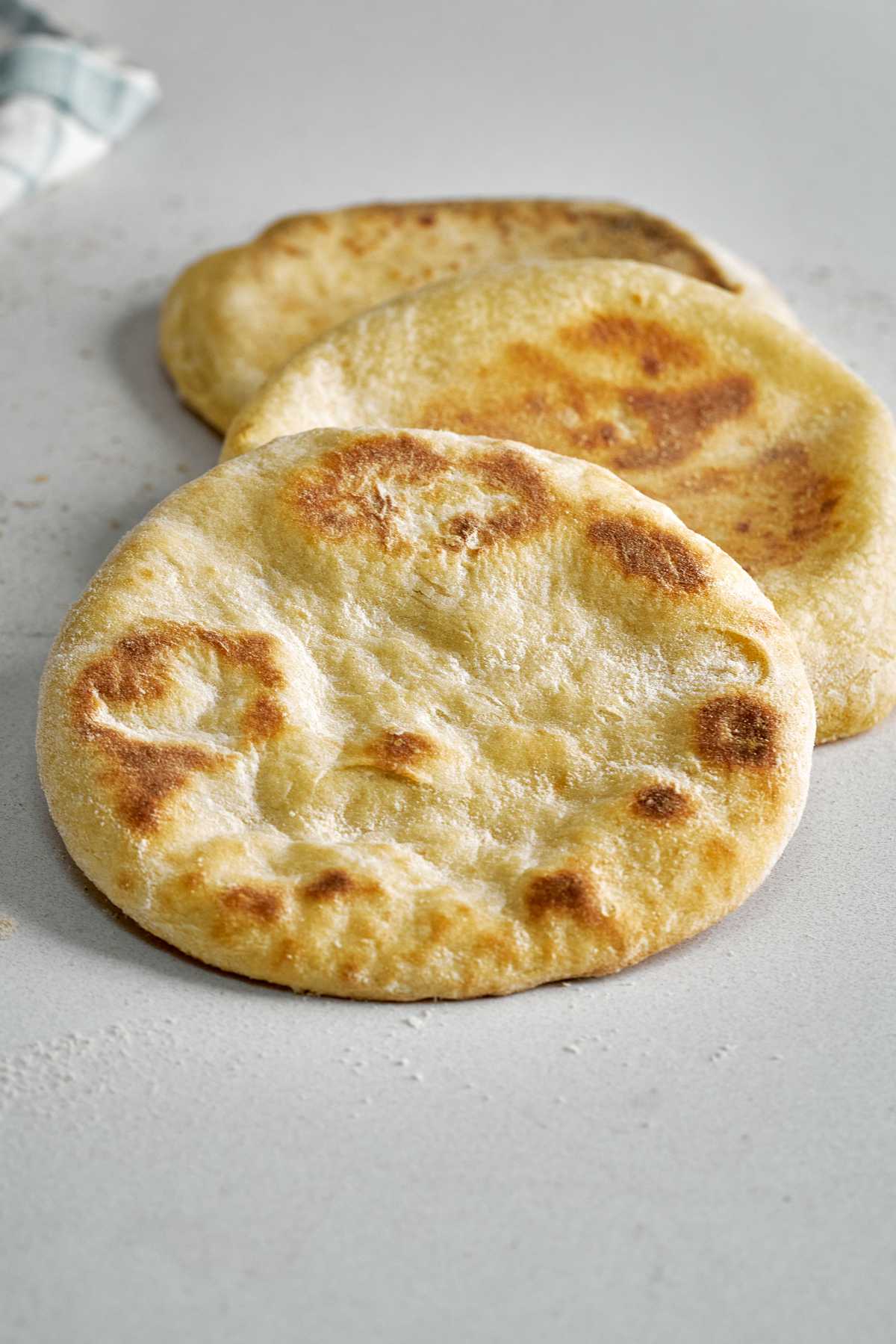 Pita bread on a countertop.