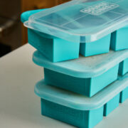 Turquoise silicone freezer trays with lids from Souper Cubes.