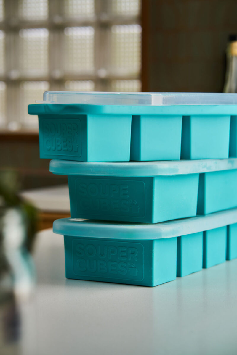 Turquoise silicone freezer trays with lids from Souper Cubes.
