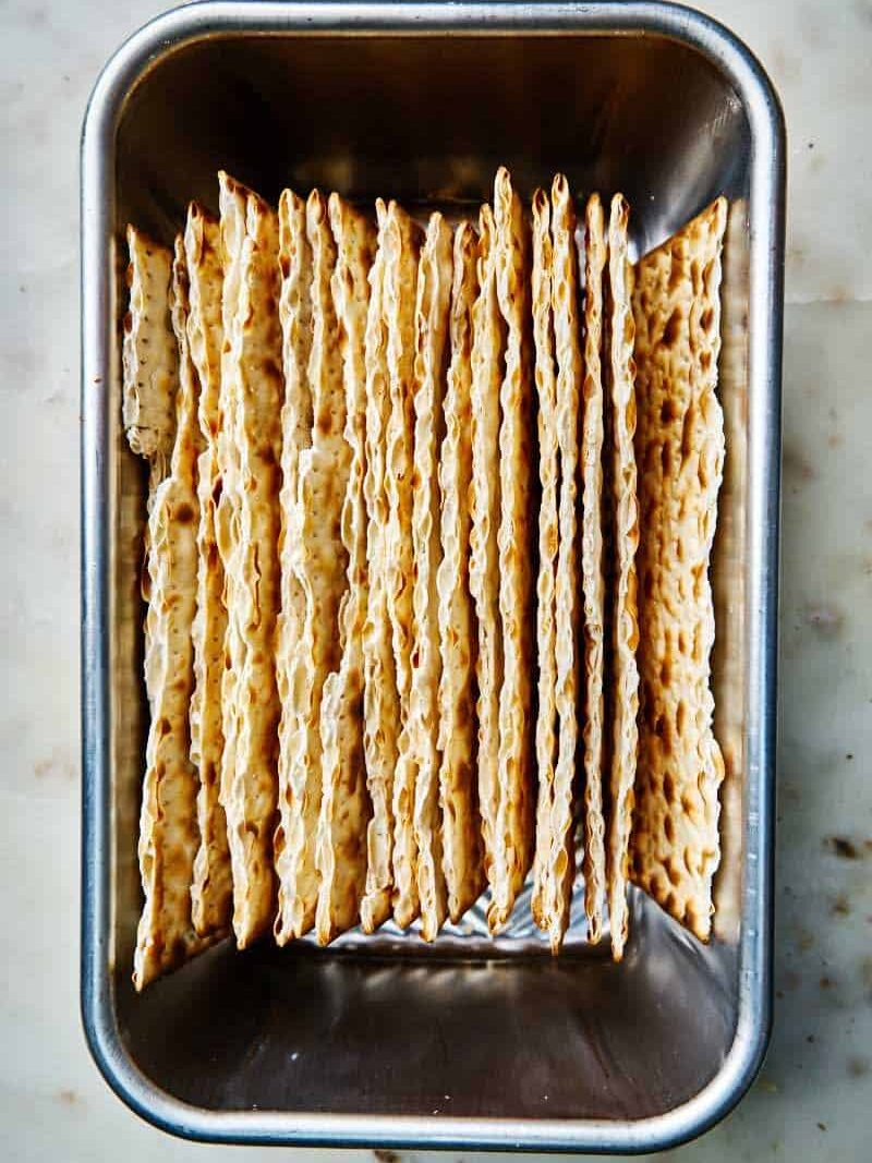 Matzo layered in a loaf pan.